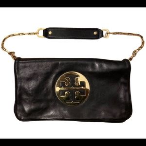 Tory Burch black clutch with detachable gold shoulder strap. Used once!